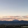 南アルプス市白根桃花橋（ループ橋）から望む夕刻の富士山と甲府盆地